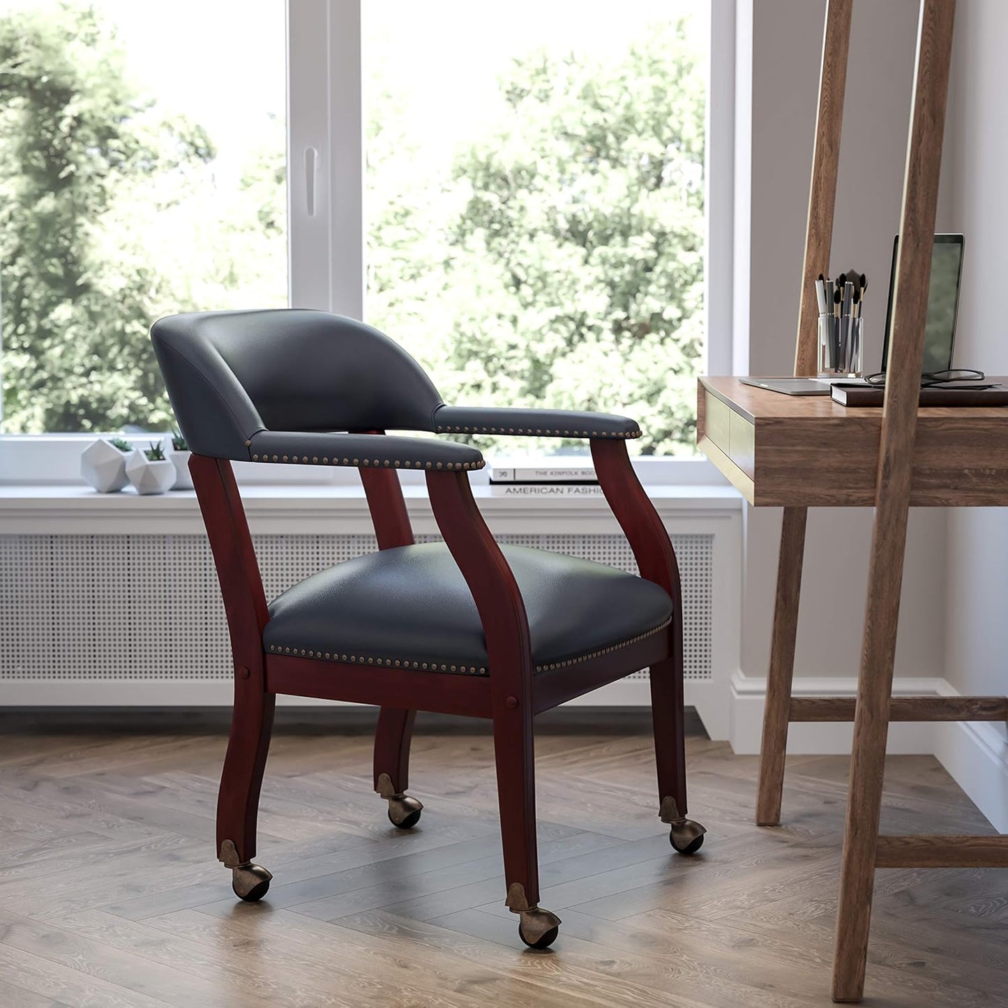 EMMA + OLIVER Navy Vinyl Luxurious Conference Chair with Casters